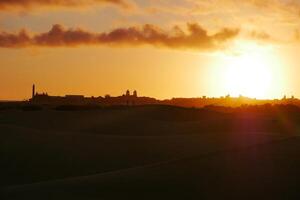 Sunset at a Maspalomas dune, Gran Canaria island photo