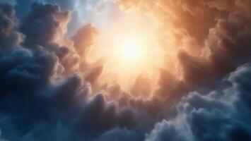 Warm sunlight pierces through a swirling formation of dark and dramatic clouds, creating a breathtaking atmospheric effect video