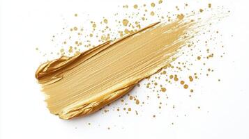 Gold paint smearing across textured surface, creating elegant backdrop with metallic shimmer photo