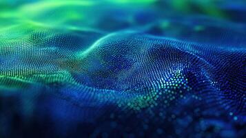 Computer generated image featuring a dynamic surface of blue and green moving particles gently 3d and waving in an elegant, modern design background photo