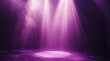 Two a spotlights illuminating hazy purple and mysterious empty stage, creating a dramatic atmosphere photo