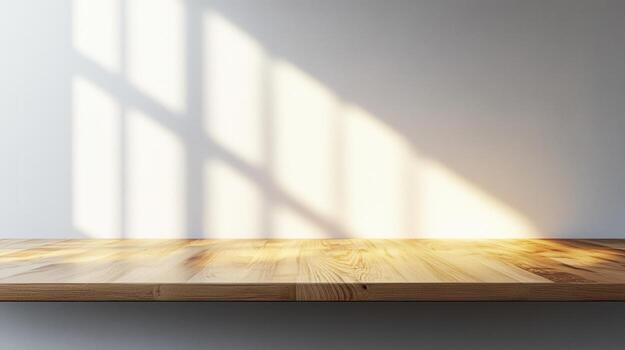 Empty wooden table top and window shadow on white wall in modern room, product display backdrop photo