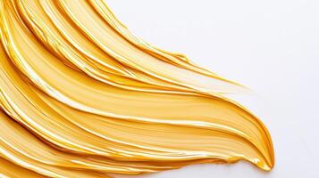 Gold paint smearing across textured surface, creating elegant artistic backdrop with metallic photo