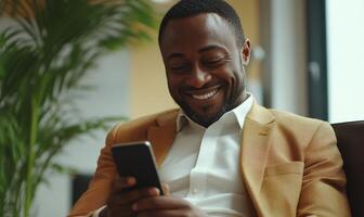 Happy mature while businessman reading good news on mobile phone and smiling in working manager modern office photo