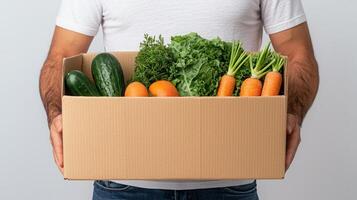 Delivery transporting cardboard box with fresh organic produce for home delivery photo