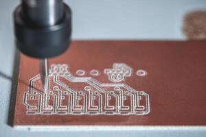 machine with control CNC carries out milling of printed circuit boards, Circuit Engraving, Diy Circuit Boards PCB photo