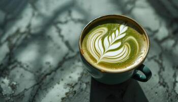 A vibrant green Matcha latte with latte art on a marble table surface under sunlight photo