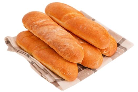 Baguettes on checkered fabric isolate on white. photo