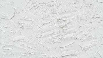 Textured of Cement surface with unique plaster pattern. Painted white to make it look luxurious and beautiful. photo