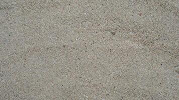 Above view of sandy beach has been smoothed out. for background and textured. photo