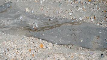 Above view of Watercourse flowing through the sand. for background and textured. photo