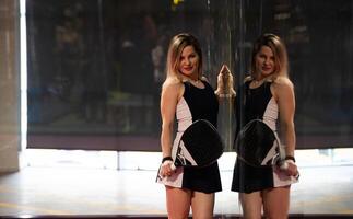 Woman during a paddle tennis match photo