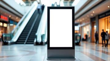 Vertical advertising billboard mockup inside shopping mall atrium photo