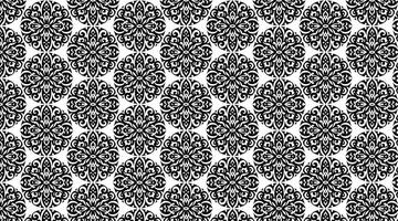 a black and white pattern with ornate designs vector