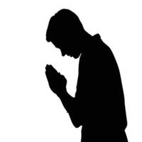 Silhouette Of A Man Praying With Hands Clasped In Reverence And Devotion vector