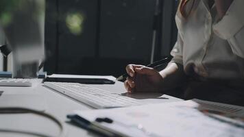 A person is writing on a computer keyboard video