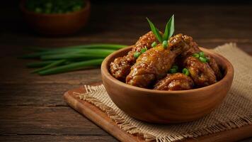 Soy sauce chicken stew with green onions in a rustic wooden bowl food photography photo