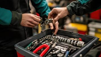 Two hands examining tools in a toolbox, emphasizing repair and maintenance work photo