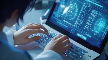 A person typing on a laptop displaying futuristic data and graphics photo
