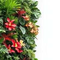 A vibrant arrangement of artificial plants and flowers against a white background photo