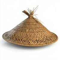 A conical straw hat, traditionally used for sun protection in agricultural settings photo