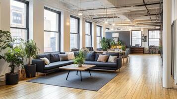 Modern office space featuring a cozy lounge area and dining setup with plants photo