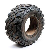 A rugged off-road tire showcasing deep treads for enhanced traction photo