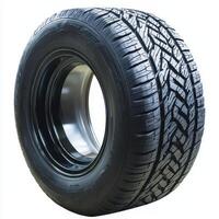 A close-up view of a car tire showcasing its tread pattern and rim design photo