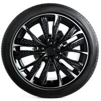 A sleek black alloy wheel showcasing intricate design and tire for automotive use photo