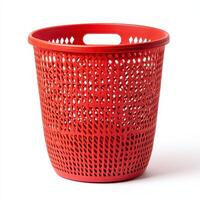 A red plastic laundry basket with a perforated design for ventilation and ease of carrying photo