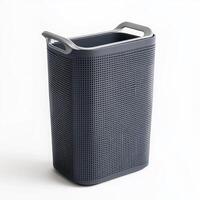 A modern, perforated laundry basket with handles for easy transport photo