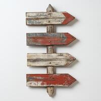 A rustic wooden signpost with four arrows, suggesting direction or choices photo