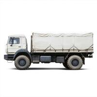 A side view of a large military-style truck with a covered cargo area photo