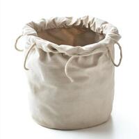 A beige fabric storage bag with a drawstring closure, ideal for organizing items photo
