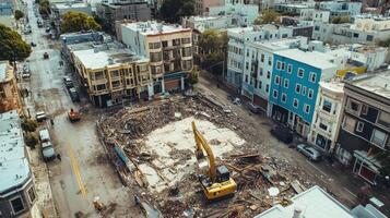 A construction site with debris and machinery in an urban area photo