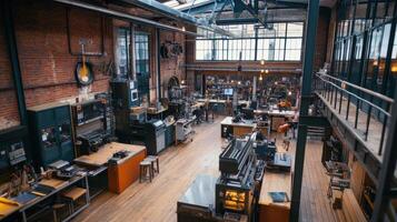 A spacious, industrial-style kitchen and workshop filled with equipment and workspaces photo