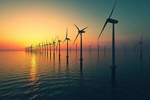 Wind turbines at sunset over calm waters, highlighting renewable energy photo