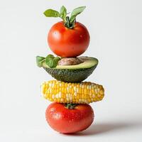 A creative stack of fresh vegetables showcasing healthy eating. photo