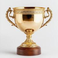 A shiny golden trophy with ornate handles, symbolizing achievement and victory photo