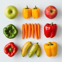 A colorful arrangement of fruits and vegetables on a white background. photo
