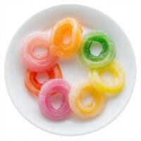 A plate of colorful gelatin rings in various flavors, showcasing a vibrant dessert. photo