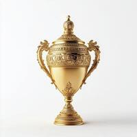 An ornate golden trophy with intricate designs and handles, symbolizing achievement and victory photo