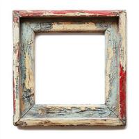 A weathered, vintage picture frame with peeling paint and a rustic appearance. photo