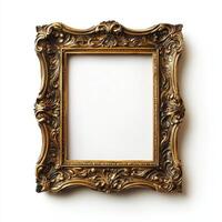 An ornate gold picture frame with intricate designs, empty for artwork or photographs. photo