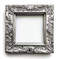 An ornate silver picture frame with intricate designs, intended for displaying artwork or photos. photo