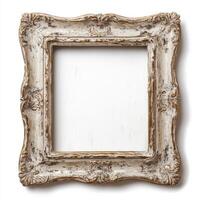 An ornate, vintage picture frame with a distressed finish, empty and ready for artwork. photo