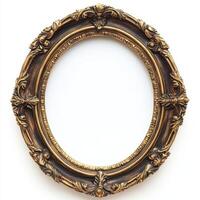 An ornate, vintage-style picture frame with intricate floral designs and a blank interior. photo