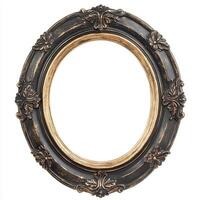 An ornate, vintage-style oval picture frame in black and gold, designed for displaying artwork. photo