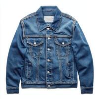 A classic blue denim jacket with a button-up front and multiple pockets. photo