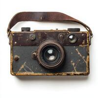An old, worn-out camera showcasing vintage design and photography history. photo